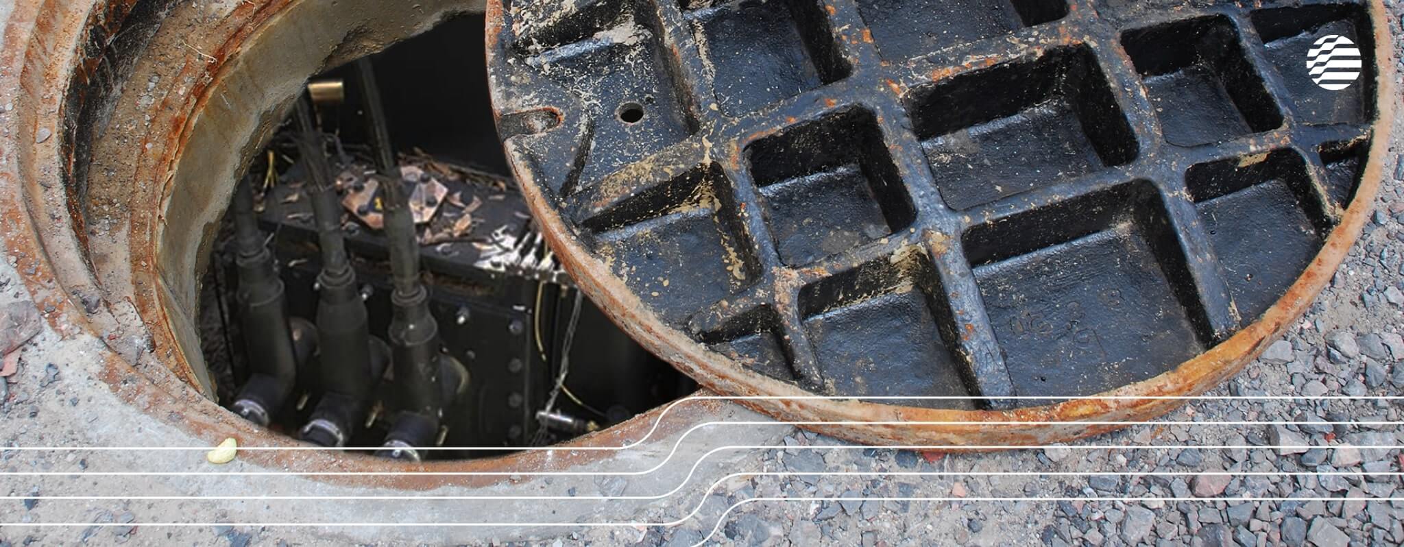 Manhole cover above underground power network.